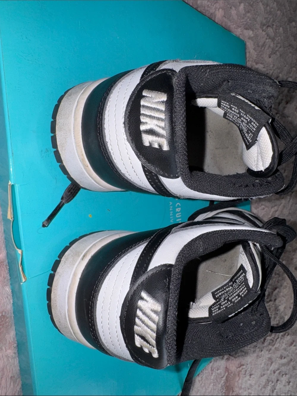 Nike Black and White Low-Top Sneakers with Cream Tongues